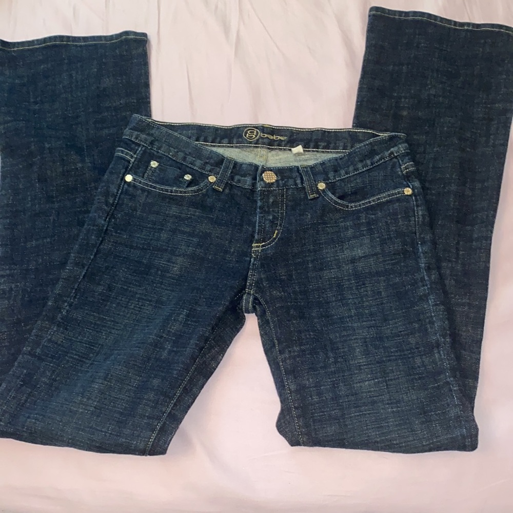 Bebe flare dark wash jeans.